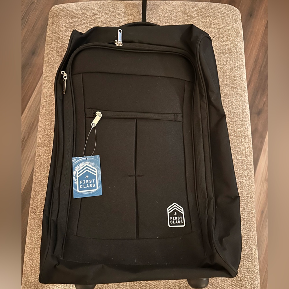 First Class’ Rolling Travel Luggage Bag. NWT